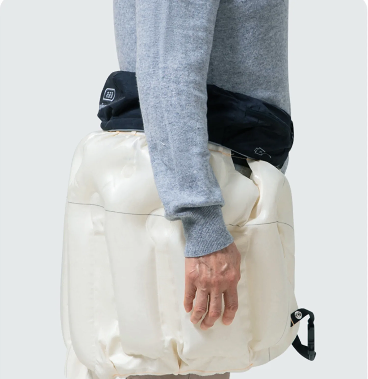 Side view of the deployed hip airbag
